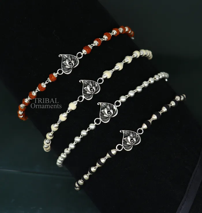 Bracelets TRIBAL ORNAMENTS 925 sterling silver handmade lord Ganesha on Paanbetel leaf design Rakhi bracelet with amazing Rudraksha Tulsi beaded bracelet rk182 Bracelets TRIBAL ORNAMENTS 925 sterling silver handmade lord Ganesha on Paanbetel leaf design Rakhi bracelet with amazing Rudraksha Tulsi beaded bracelet rk182