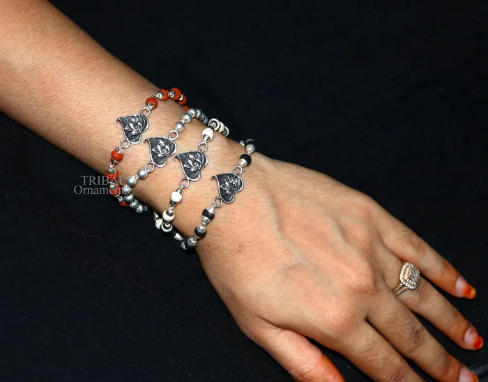Bracelets TRIBAL ORNAMENTS 925 sterling silver handmade lord Ganesha on Paanbetel leaf design Rakhi bracelet with amazing Rudraksha Tulsi beaded bracelet rk182 Bracelets TRIBAL ORNAMENTS 925 sterling silver handmade lord Ganesha on Paanbetel leaf design Rakhi bracelet with amazing Rudraksha Tulsi beaded bracelet rk182
