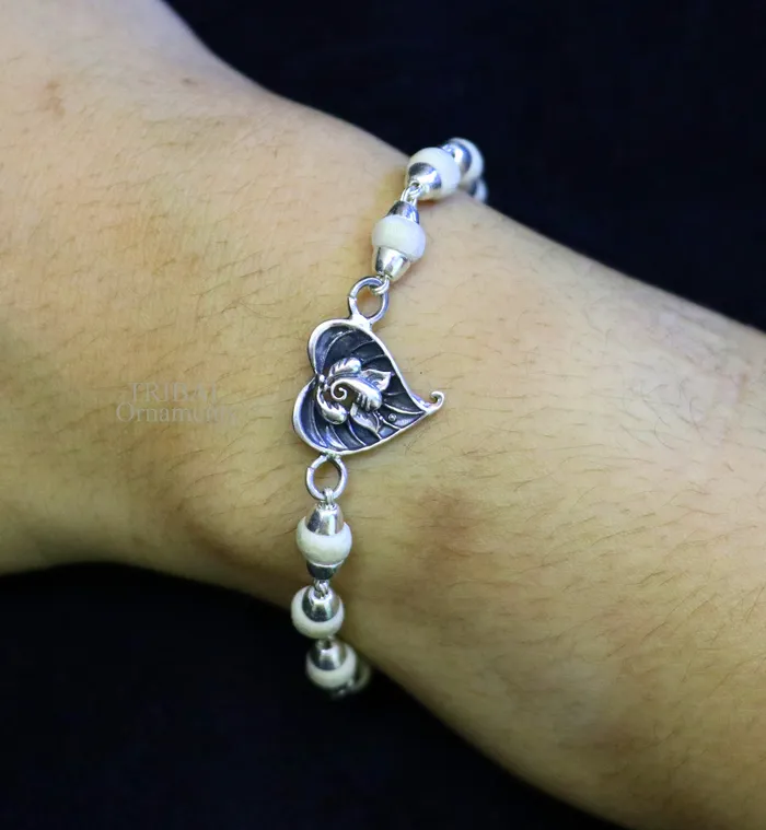 Bracelets TRIBAL ORNAMENTS 925 sterling silver handmade lord Ganesha on Paanbetel leaf design Rakhi bracelet with amazing Rudraksha Tulsi beaded bracelet rk182 Bracelets TRIBAL ORNAMENTS 925 sterling silver handmade lord Ganesha on Paanbetel leaf design Rakhi bracelet with amazing Rudraksha Tulsi beaded bracelet rk182