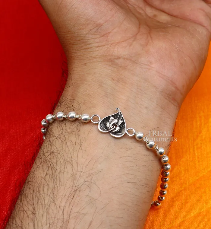 Bracelets TRIBAL ORNAMENTS 925 sterling silver handmade lord Ganesha on Paanbetel leaf design Rakhi bracelet with amazing Rudraksha Tulsi beaded bracelet rk182 Bracelets TRIBAL ORNAMENTS 925 sterling silver handmade lord Ganesha on Paanbetel leaf design Rakhi bracelet with amazing Rudraksha Tulsi beaded bracelet rk182