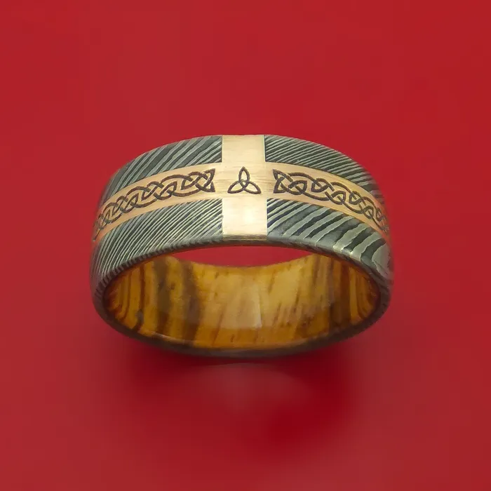 Lashbrook Rings Damascus Steel Ring with 14k Rose Gold and Etched Celtic Design Inlays and Interior Hardwood Sleeve Custom Made Band
