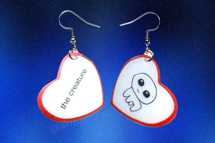 Earrings Sam Makes Things The Creature Autism TBH Creature Meme Character Locket Heart 2D detailed Handmade Earrings Earrings Sam Makes Things The Creature Autism TBH Creature Meme Character Locket Heart 2D detailed Handmade Earrings
